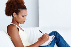 black-woman-writing-journal
